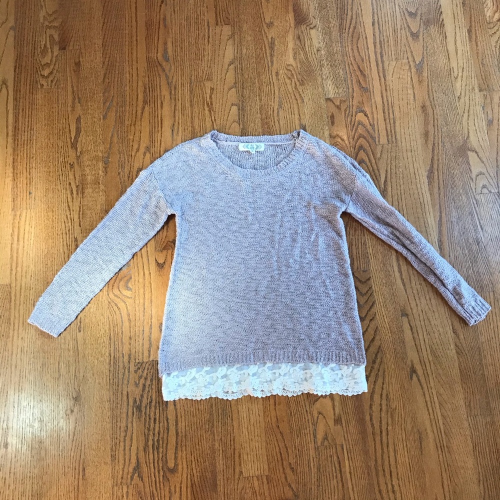 Dark pink sweater with lace at the bottom